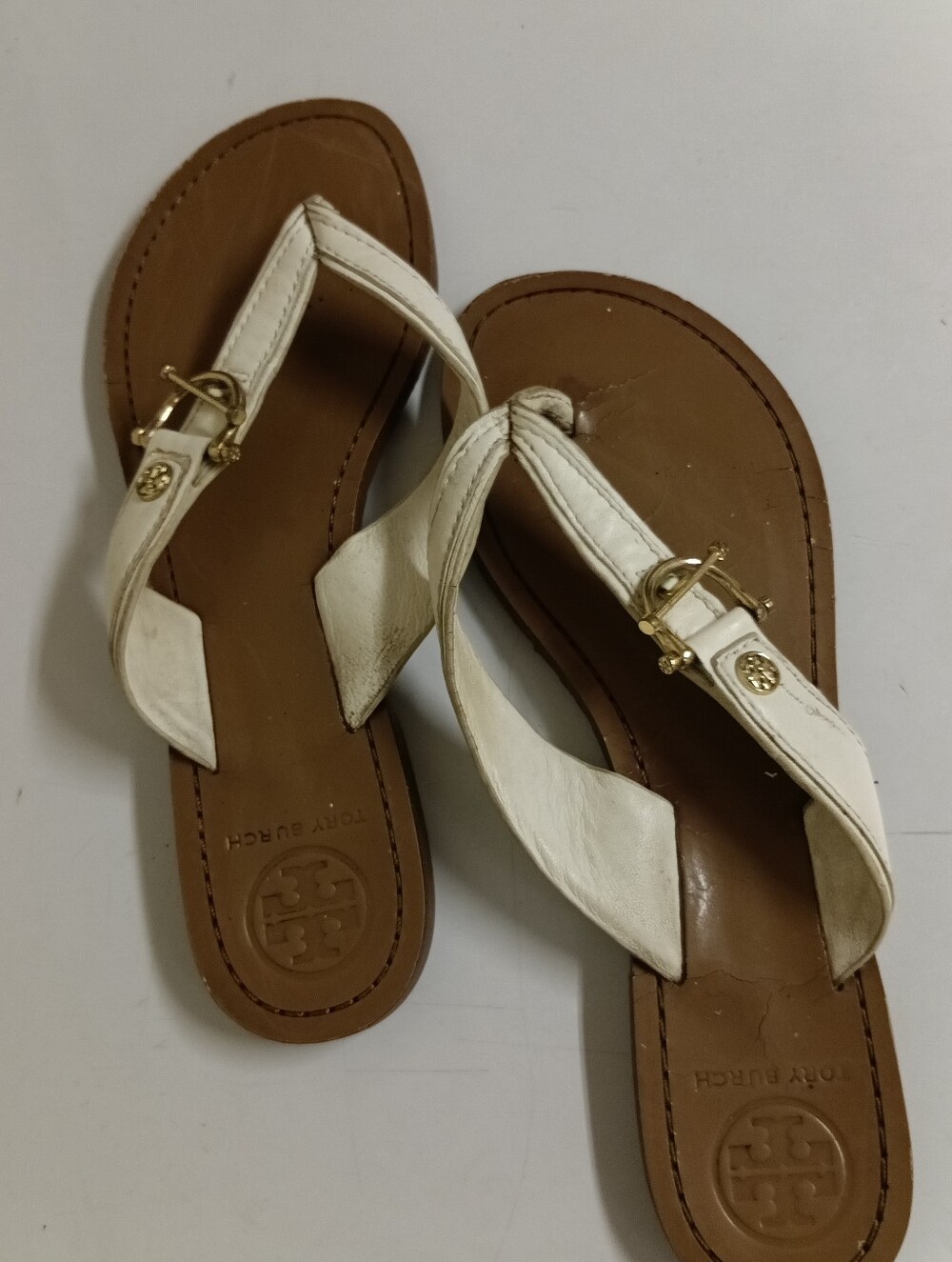 Tory Burch White Leather Thong Sandals with Gold Logo Accent
